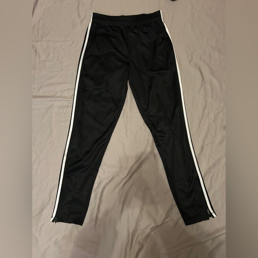 Vertical track pants in black color Size small